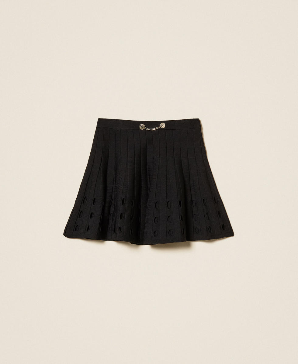 Short openwork knit skirt