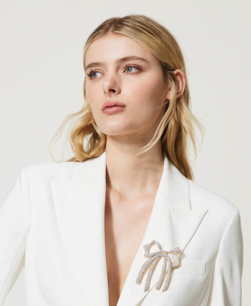 Schleifenbrosche mit Strass