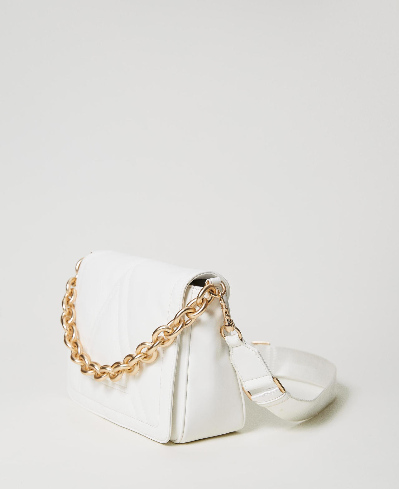 Shoulder bag with flap and embroidered logo