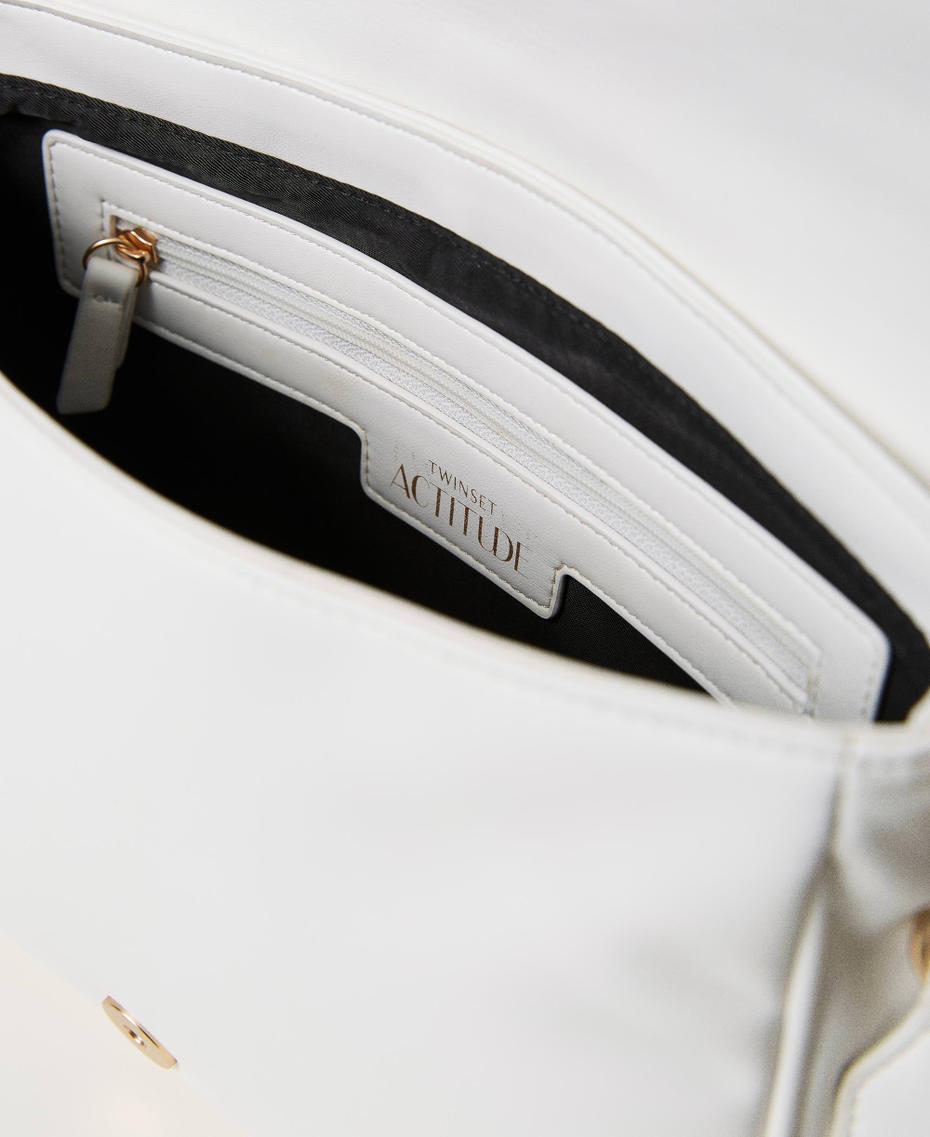 Shoulder bag with flap and embroidered logo