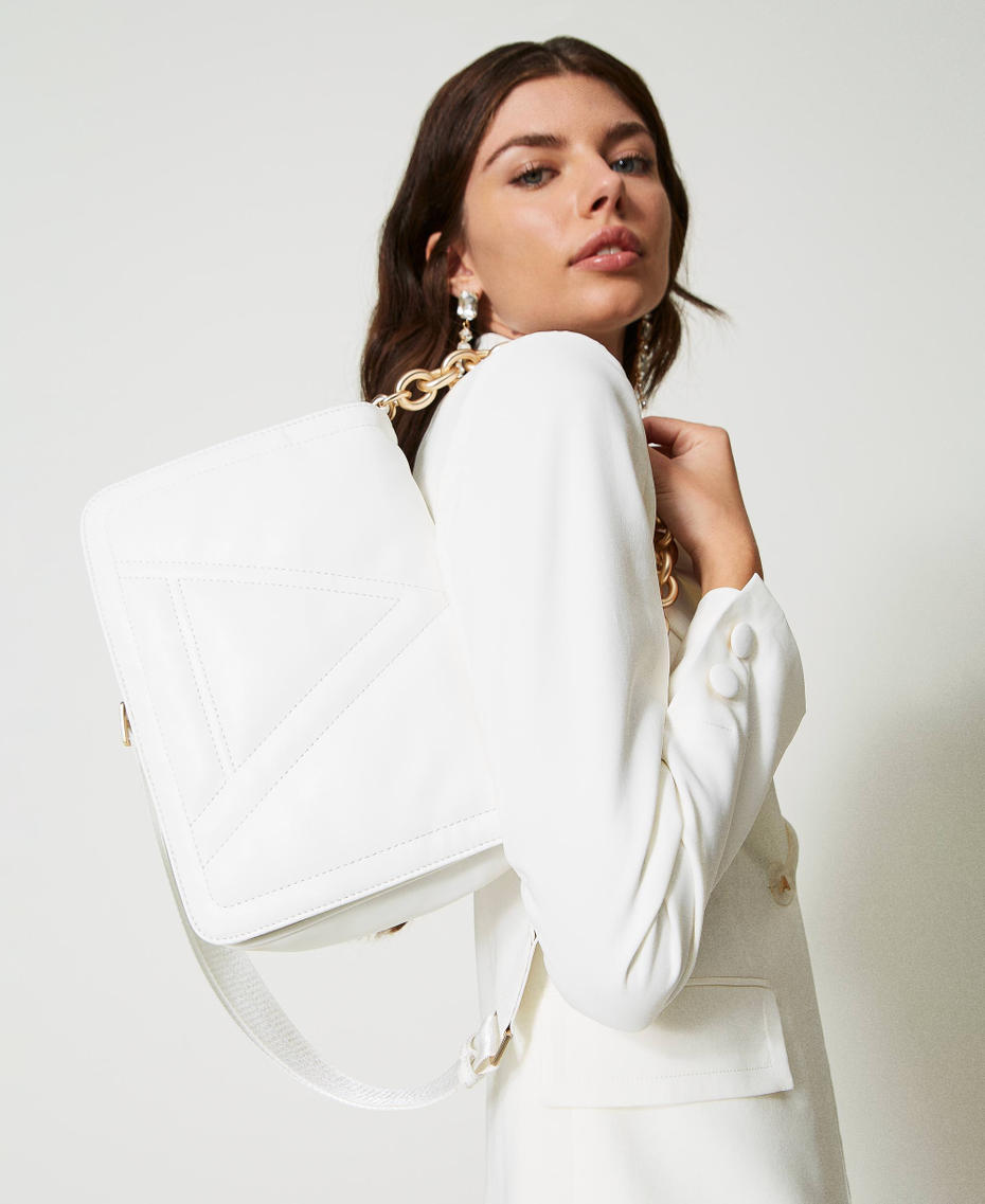 Shoulder bag with flap and embroidered logo