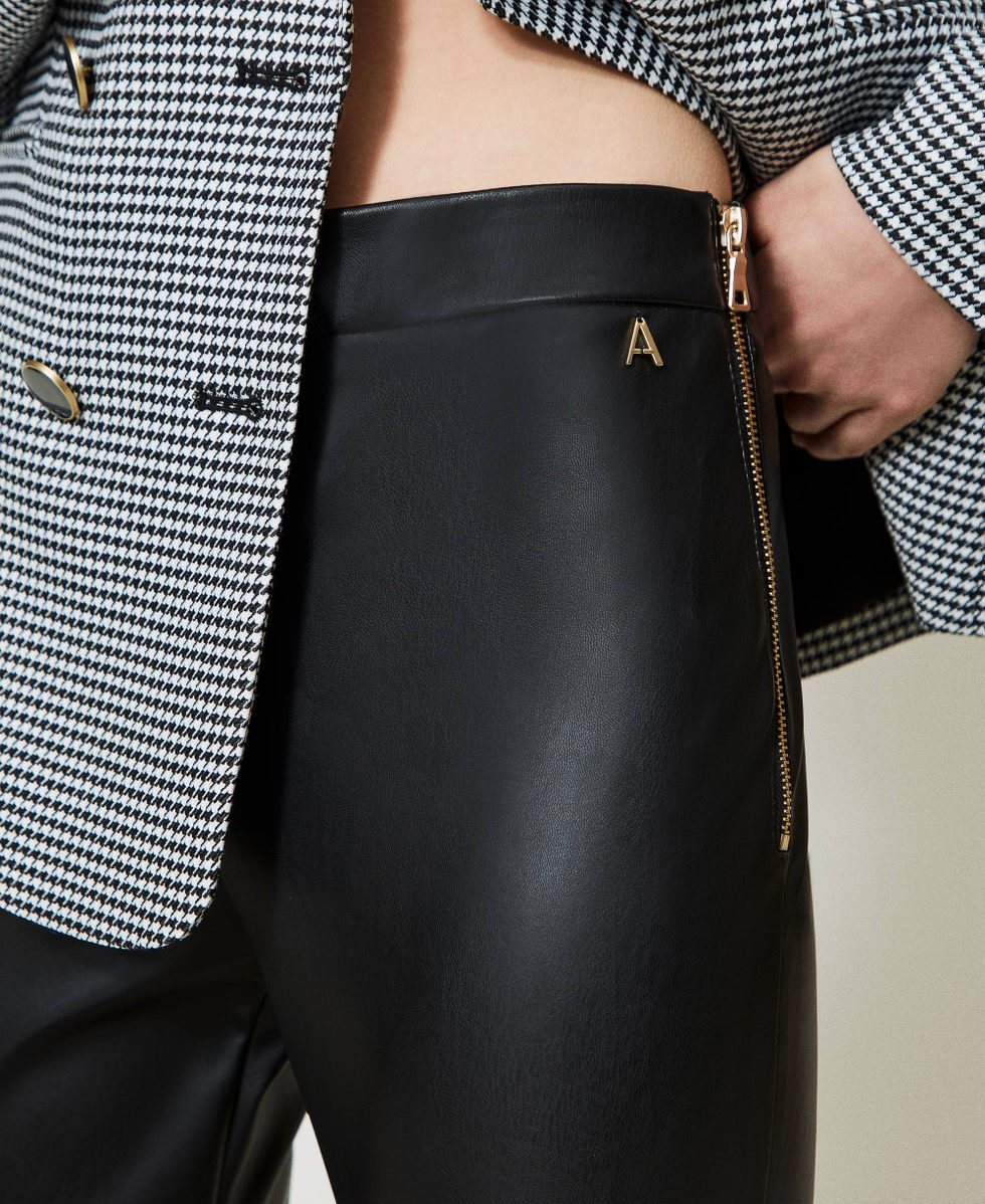 Leather-like flared trousers