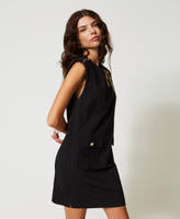 Short dress with bow embroidery