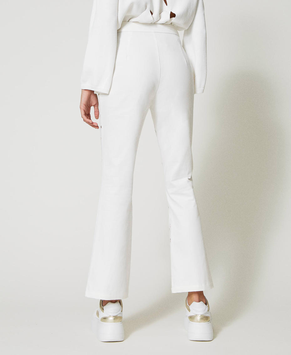 Pantalon évasé en gabardine brodée