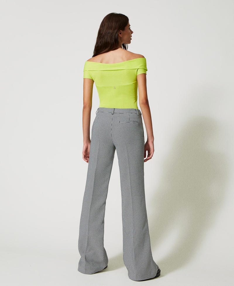 Flared houndstooth trousers