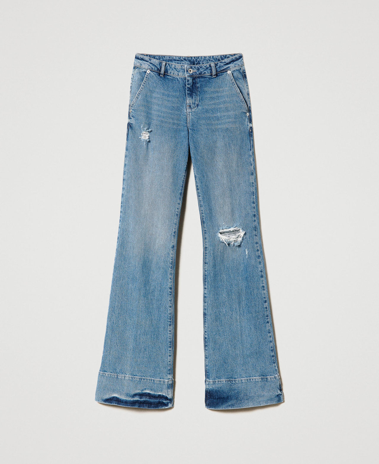 Flared jeans with rips