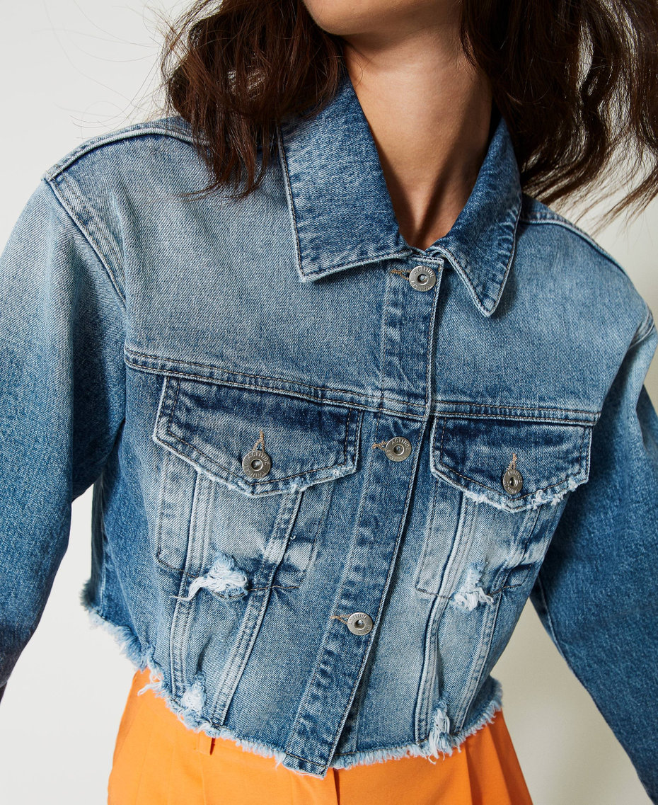 Cropped denim jacket with rips
