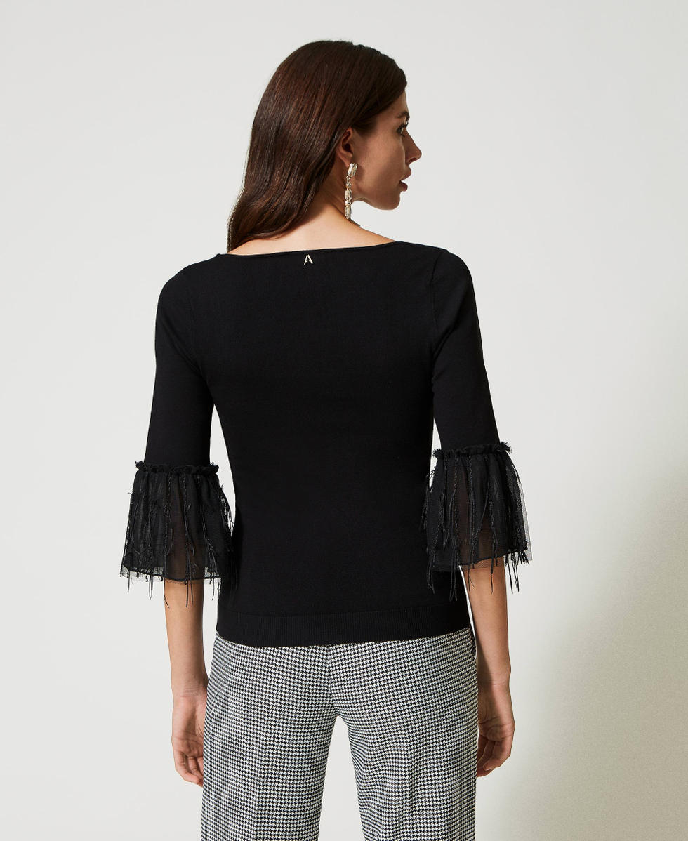 Maglia nera elegante shop