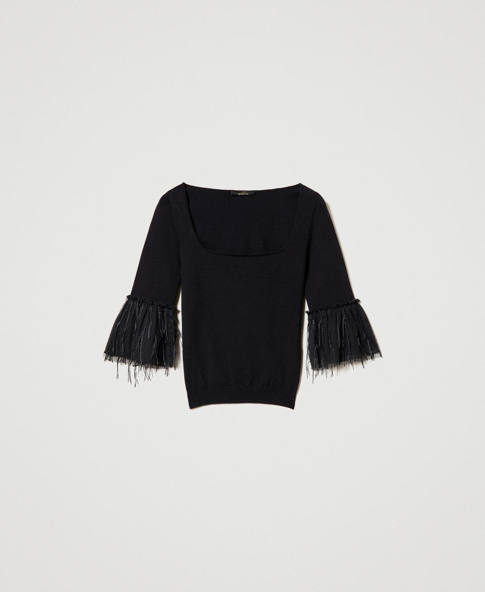 Fitted jumper with tulle fringes