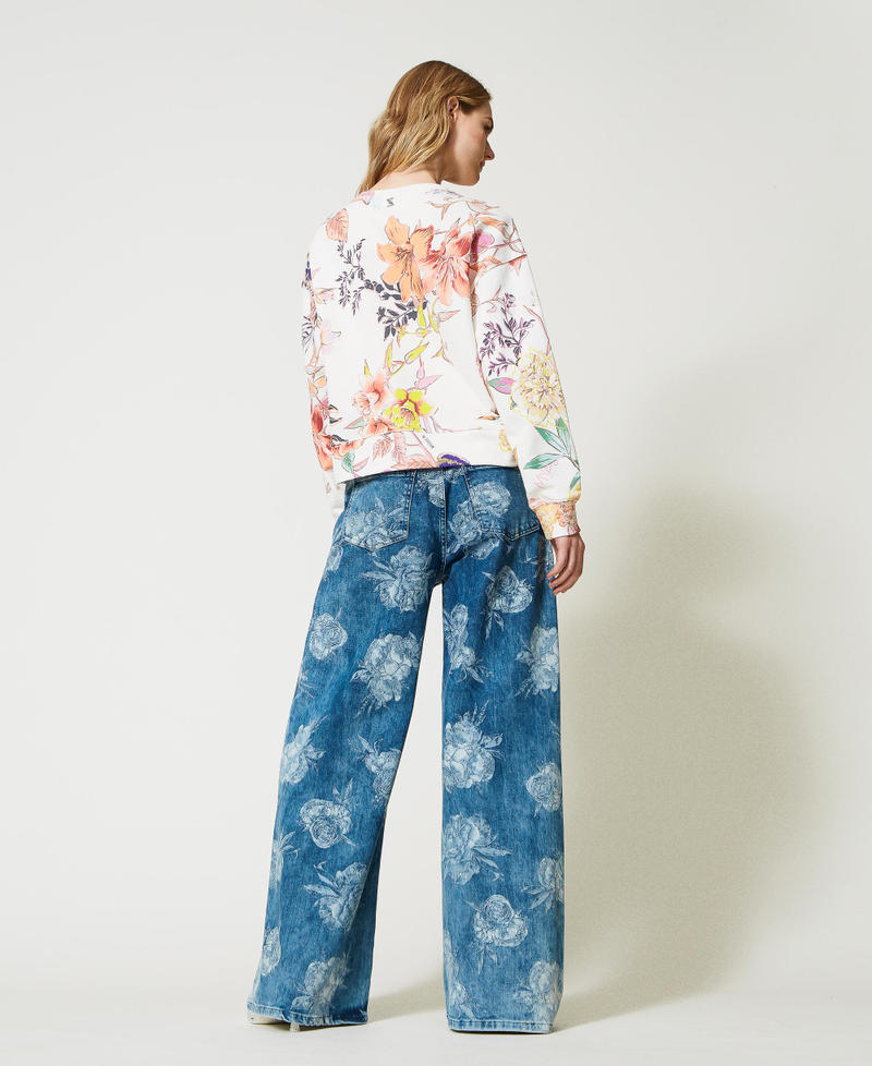 Jeans wide leg con stampa rose