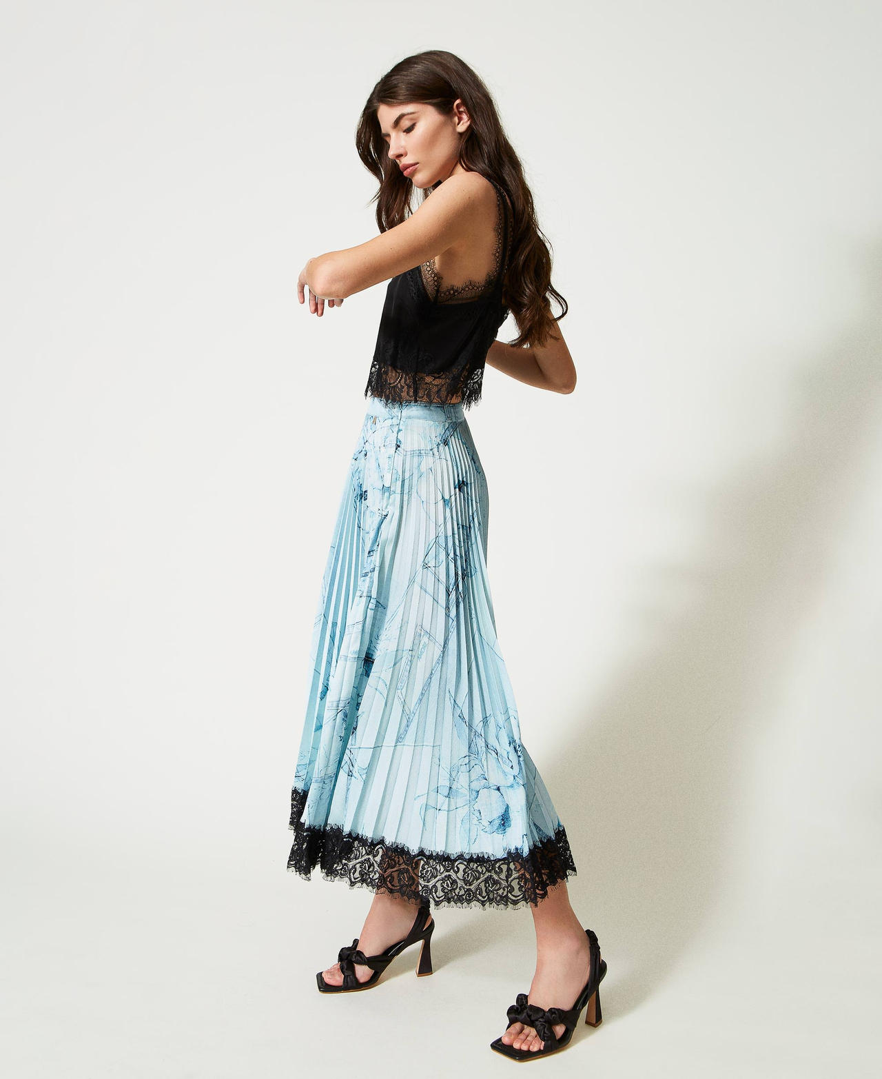 Long pleated satin skirt with lace