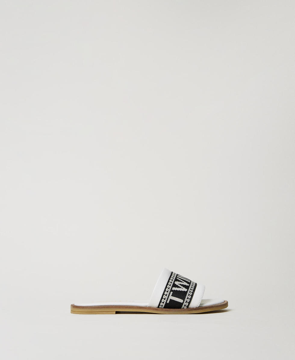 Slides with jacquard logo