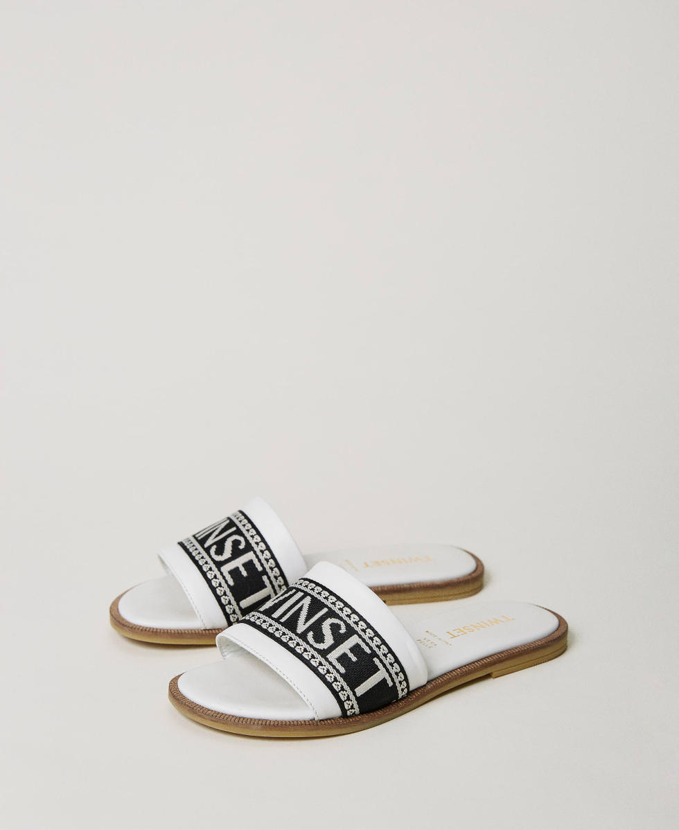 Slides with jacquard logo