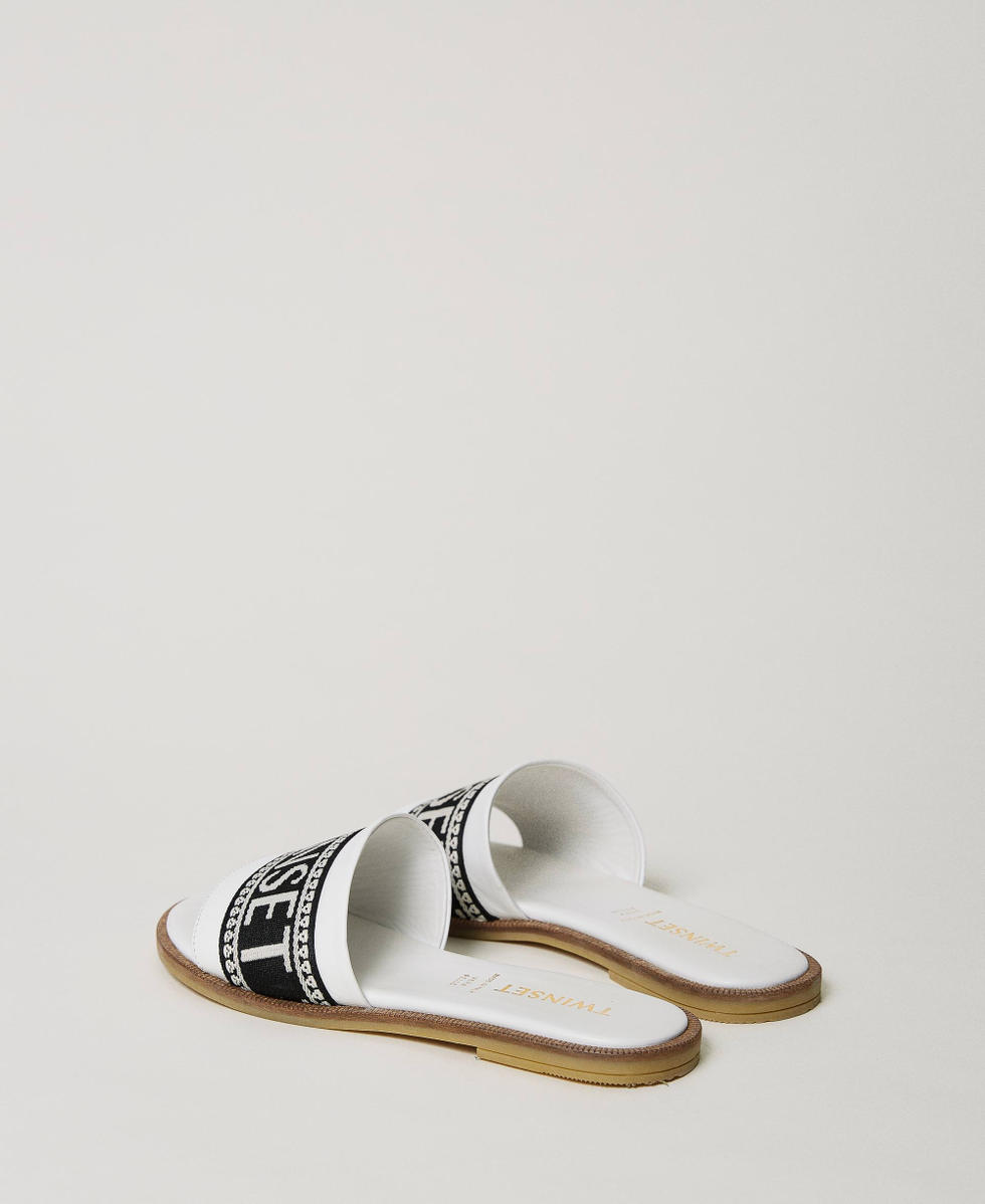 Slides with jacquard logo