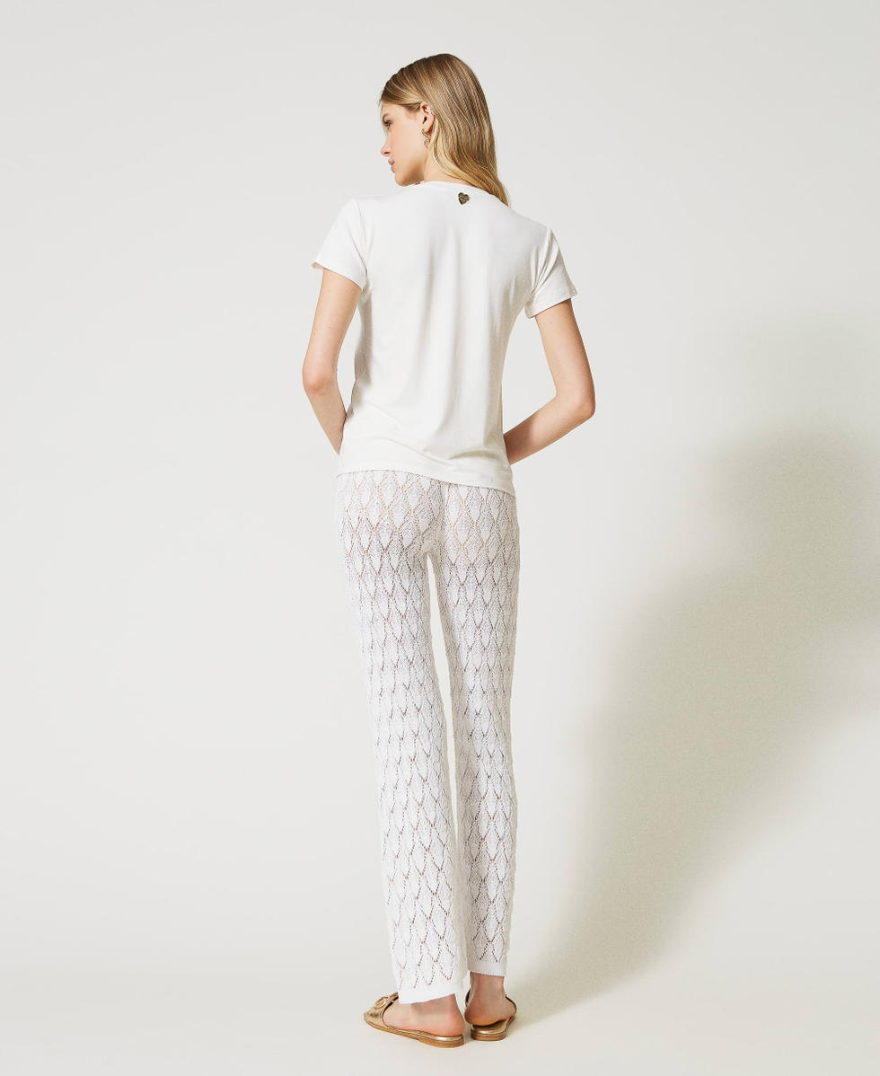 Pantalon en maille brod&eacute;e