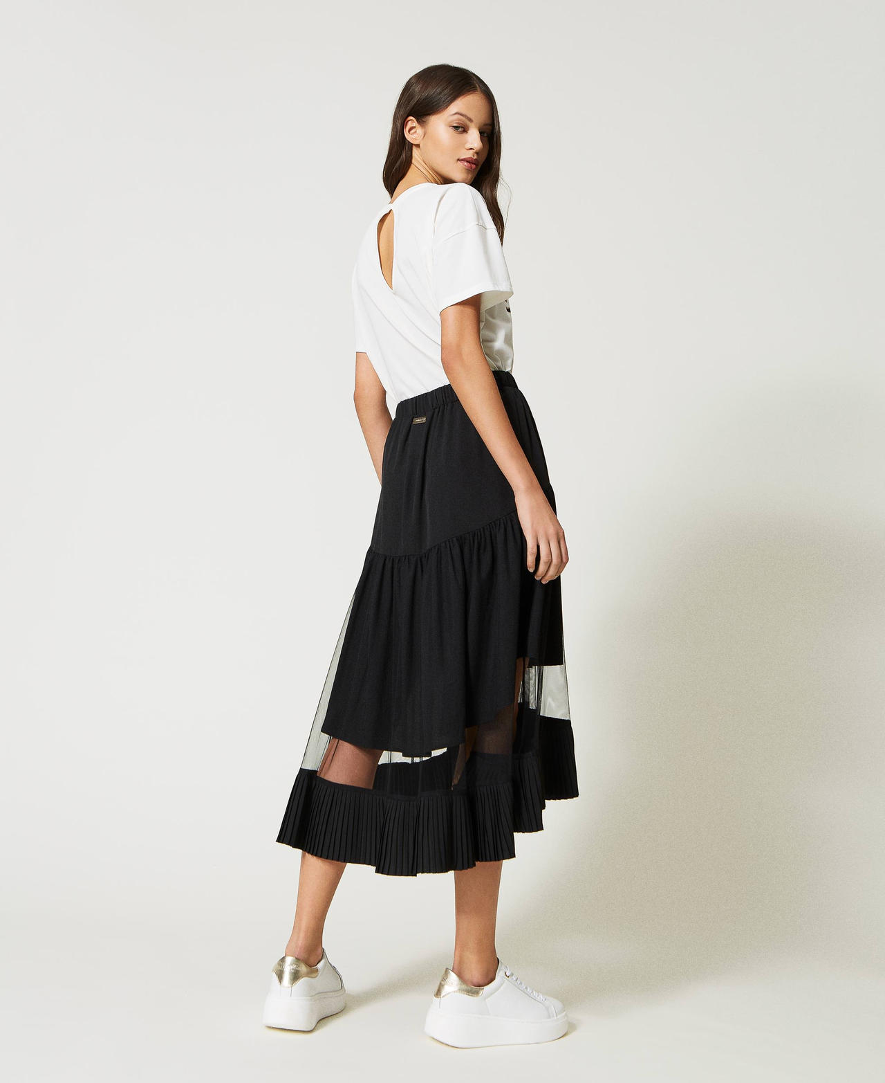 Long skirt with tulle inserts