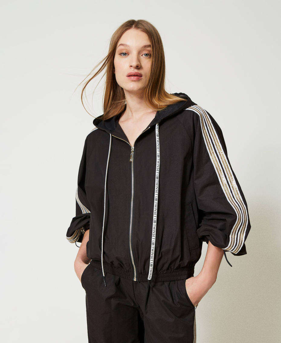 Bomber jacket with sequin embroidery