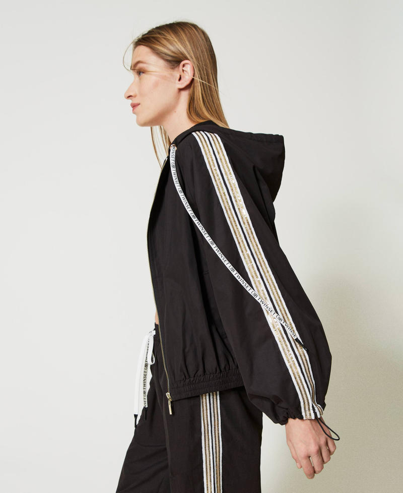 Bomber jacket with sequin embroidery