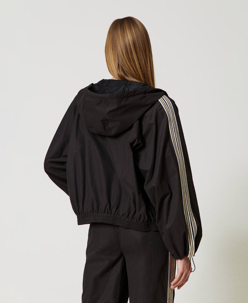 Bomber jacket with sequin embroidery