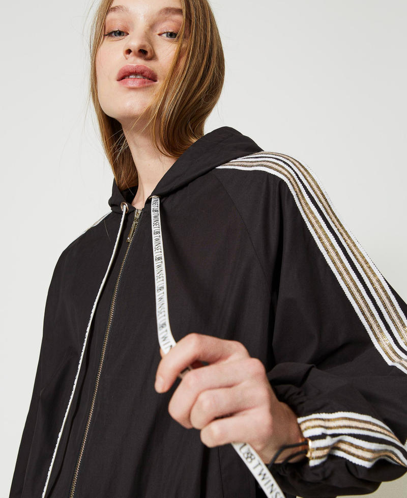 Bomber jacket with sequin embroidery