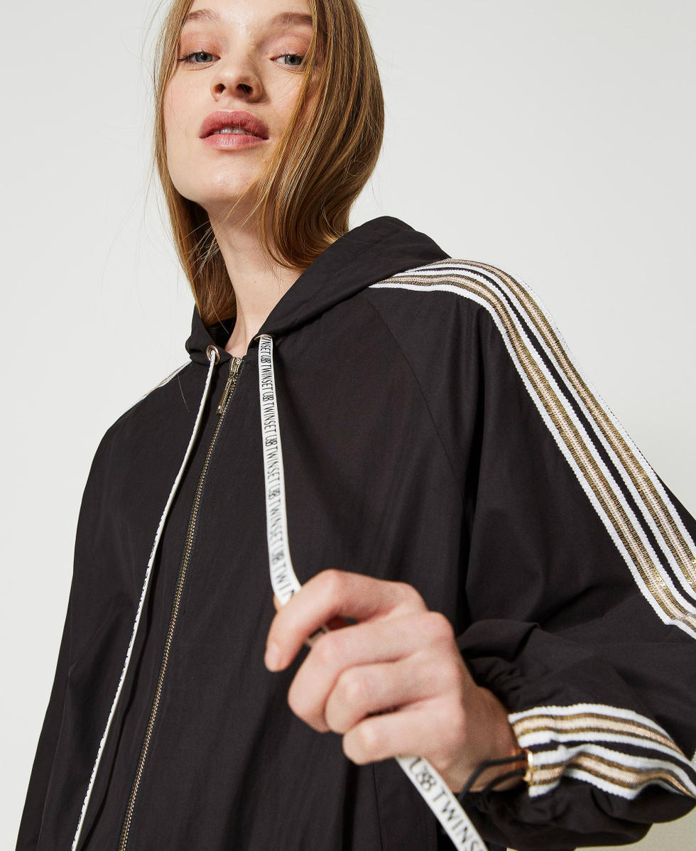 Bomber jacket with sequin embroidery