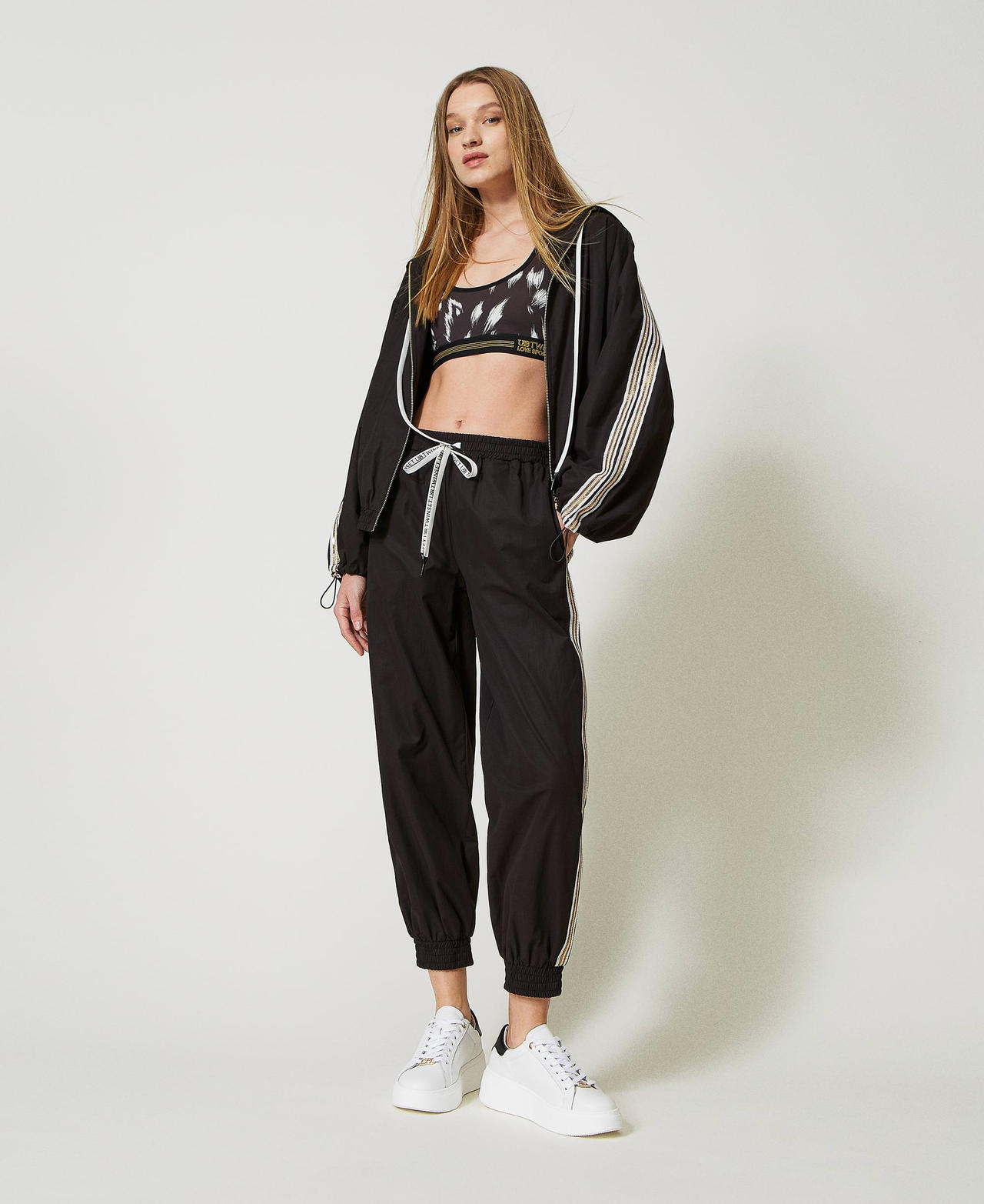 Joggers with sequin embroidery