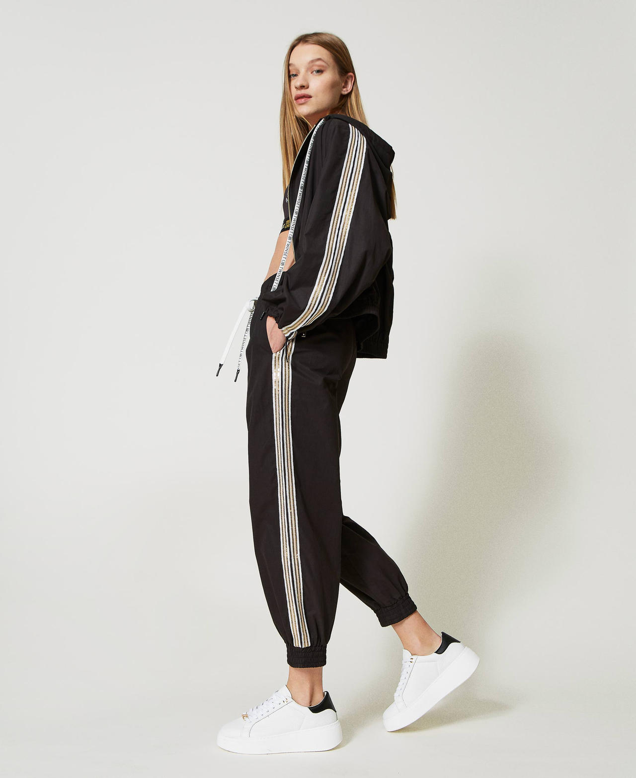 Joggers with sequin embroidery