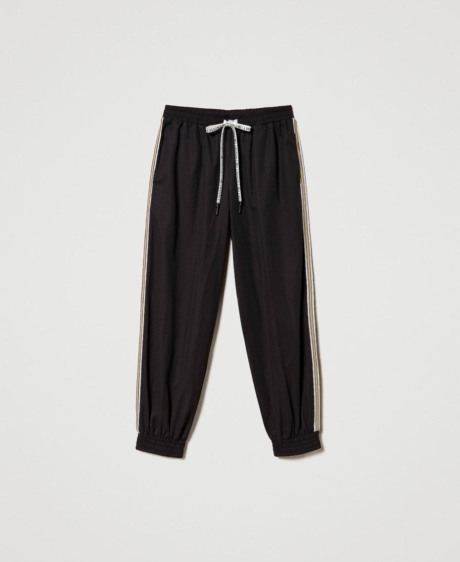 Joggers with sequin embroidery