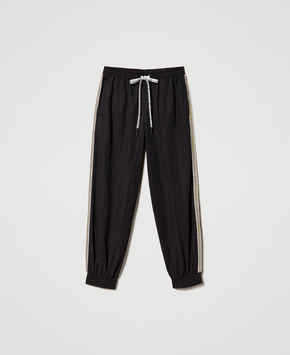 Joggers with sequin embroidery