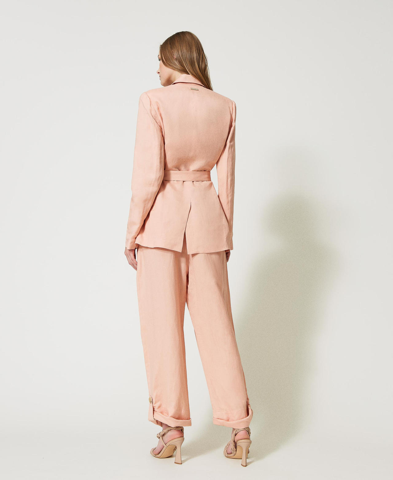 Linen blend trousers with frog fasteners