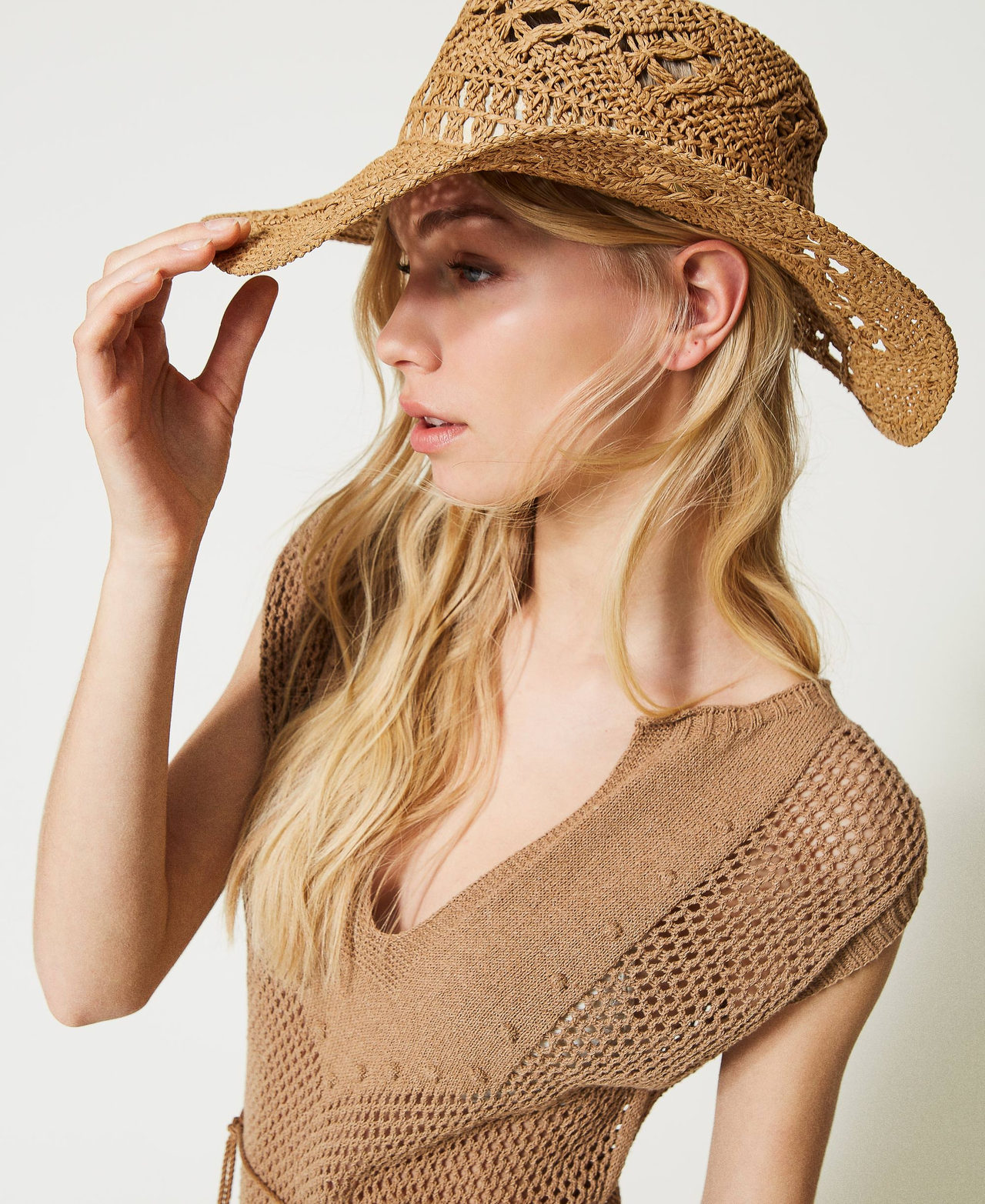 Straw-like openwork hat