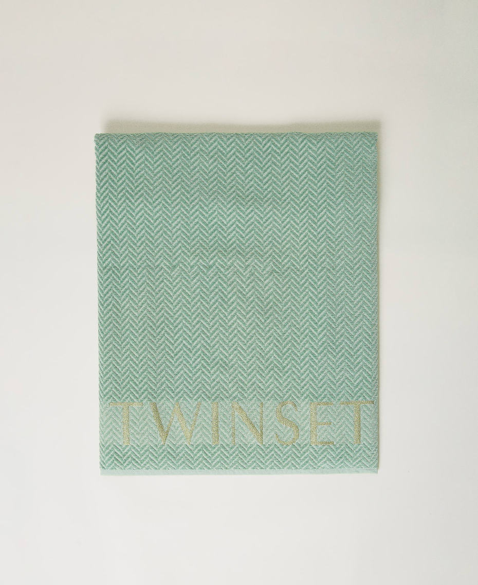 Terry beach towel with jacquard logo