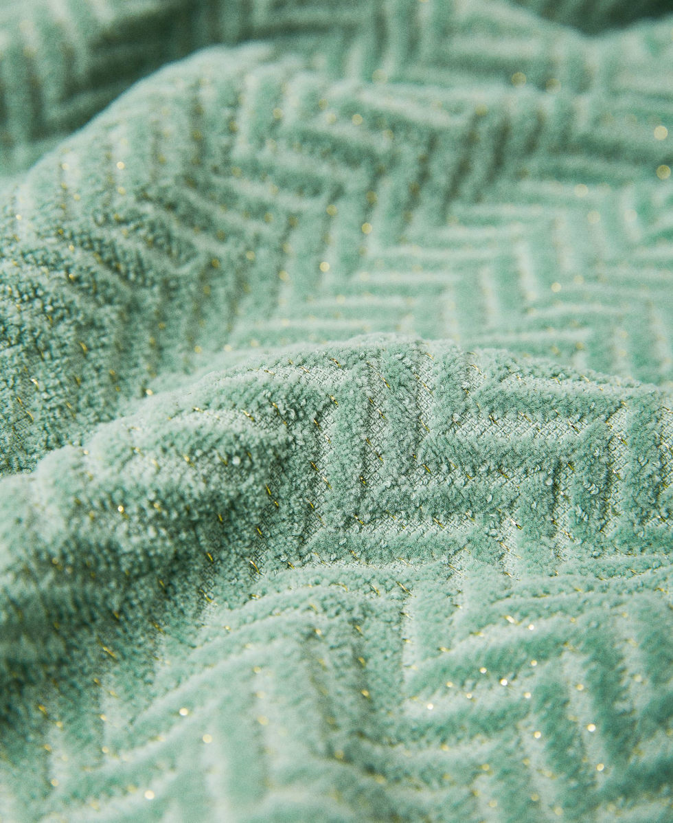 Toalla de playa en rizo con logotipo jacquard