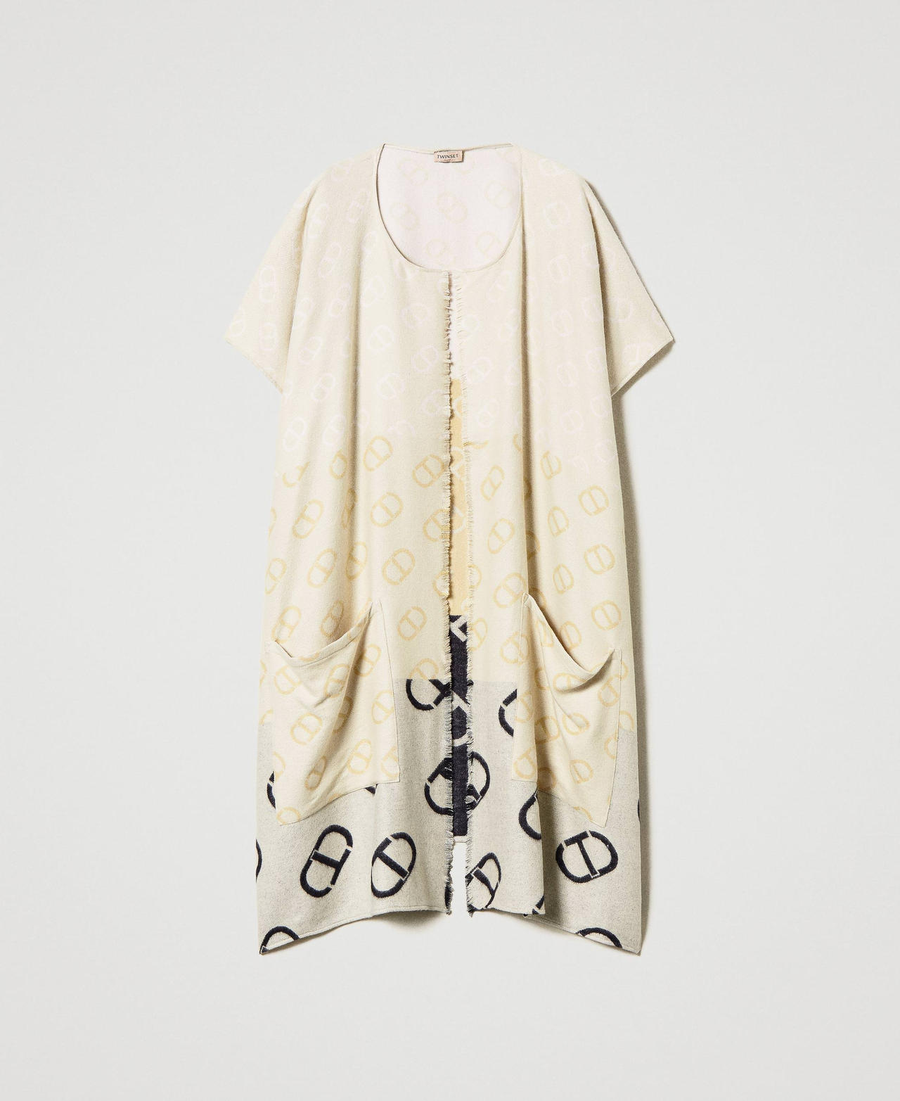 Poncho with jacquard Oval T