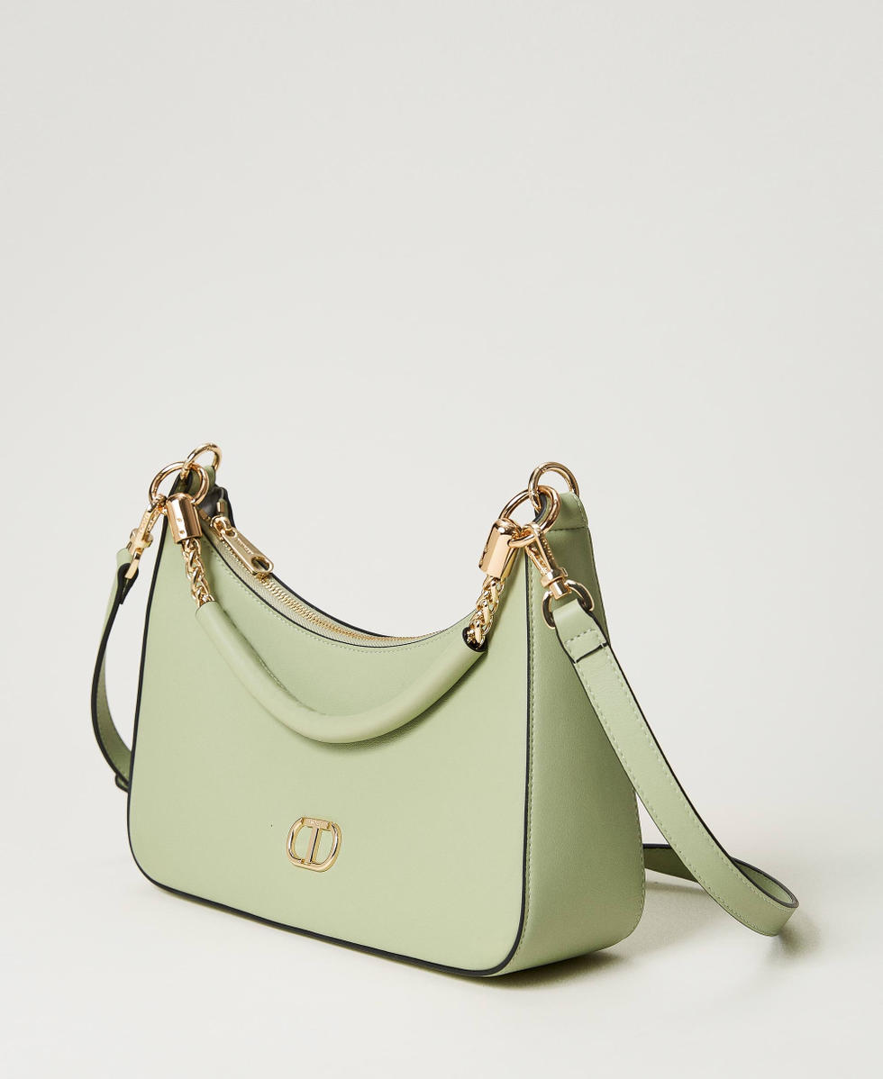 Hobo bag with torchon chains