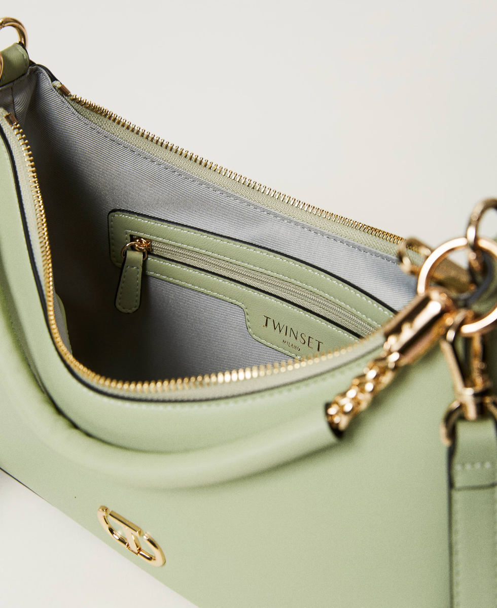 Hobo bag with torchon chains