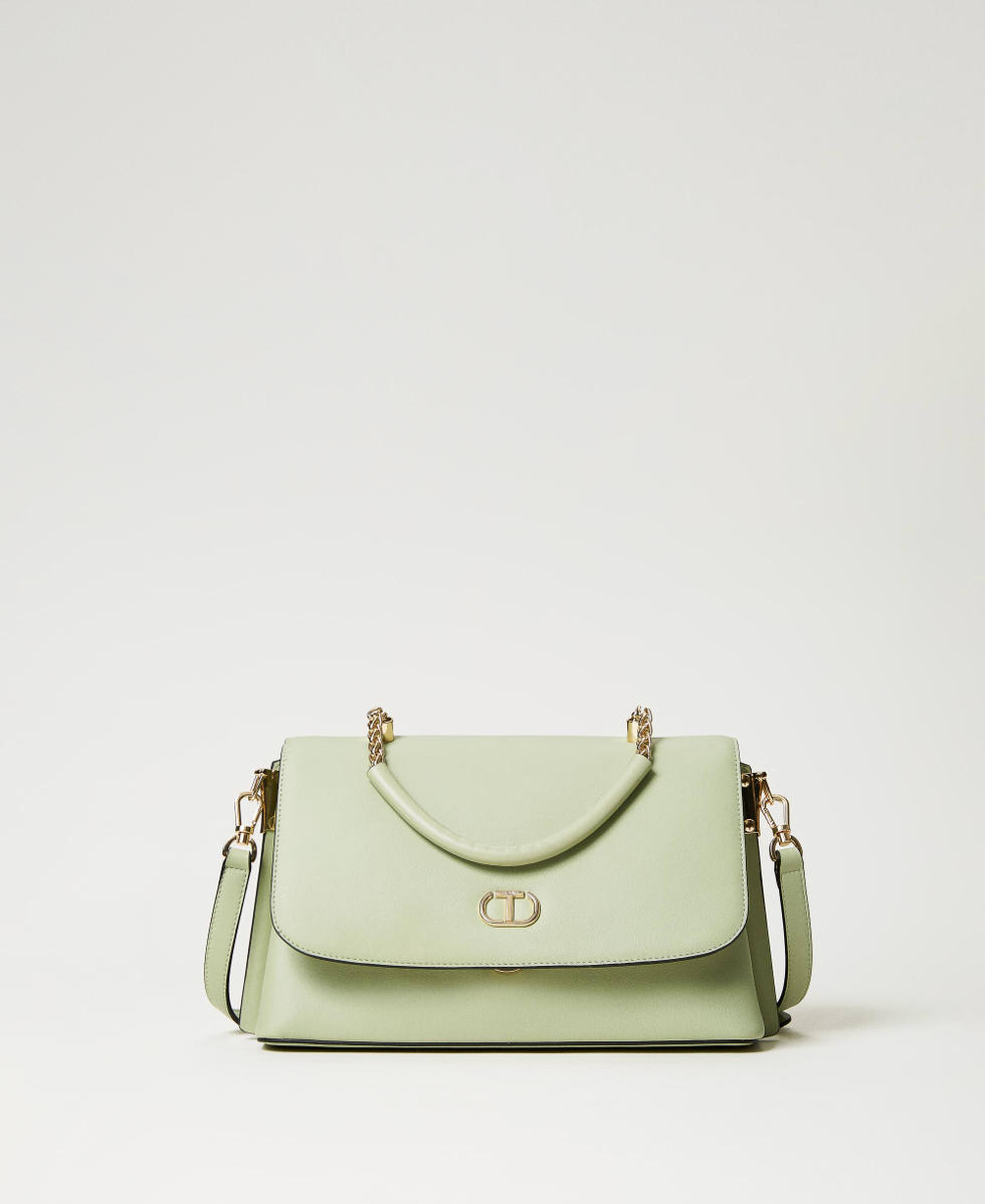 Top handle bag with torchon chains