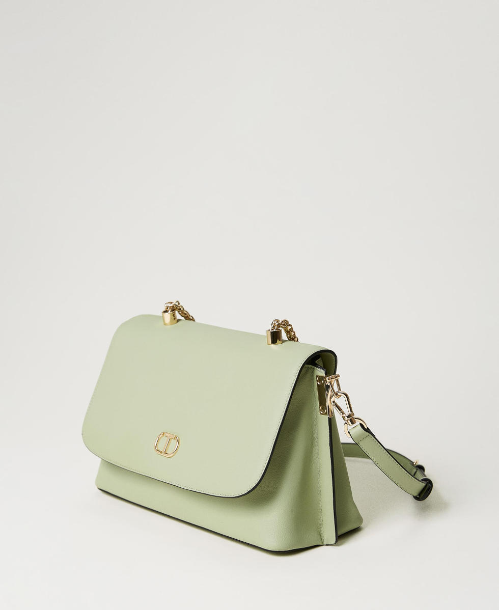 Top handle bag with torchon chains