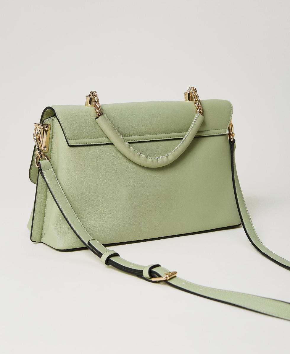 Top handle bag with torchon chains