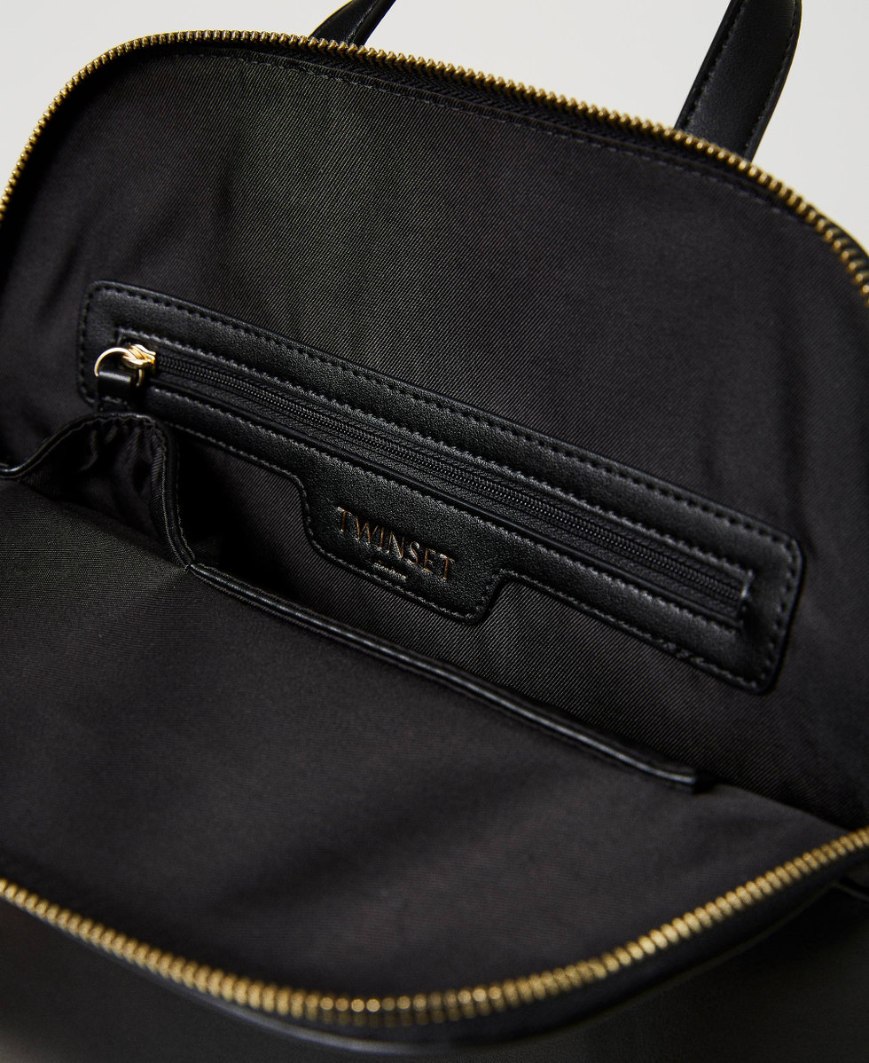 Backpack with metal Oval T