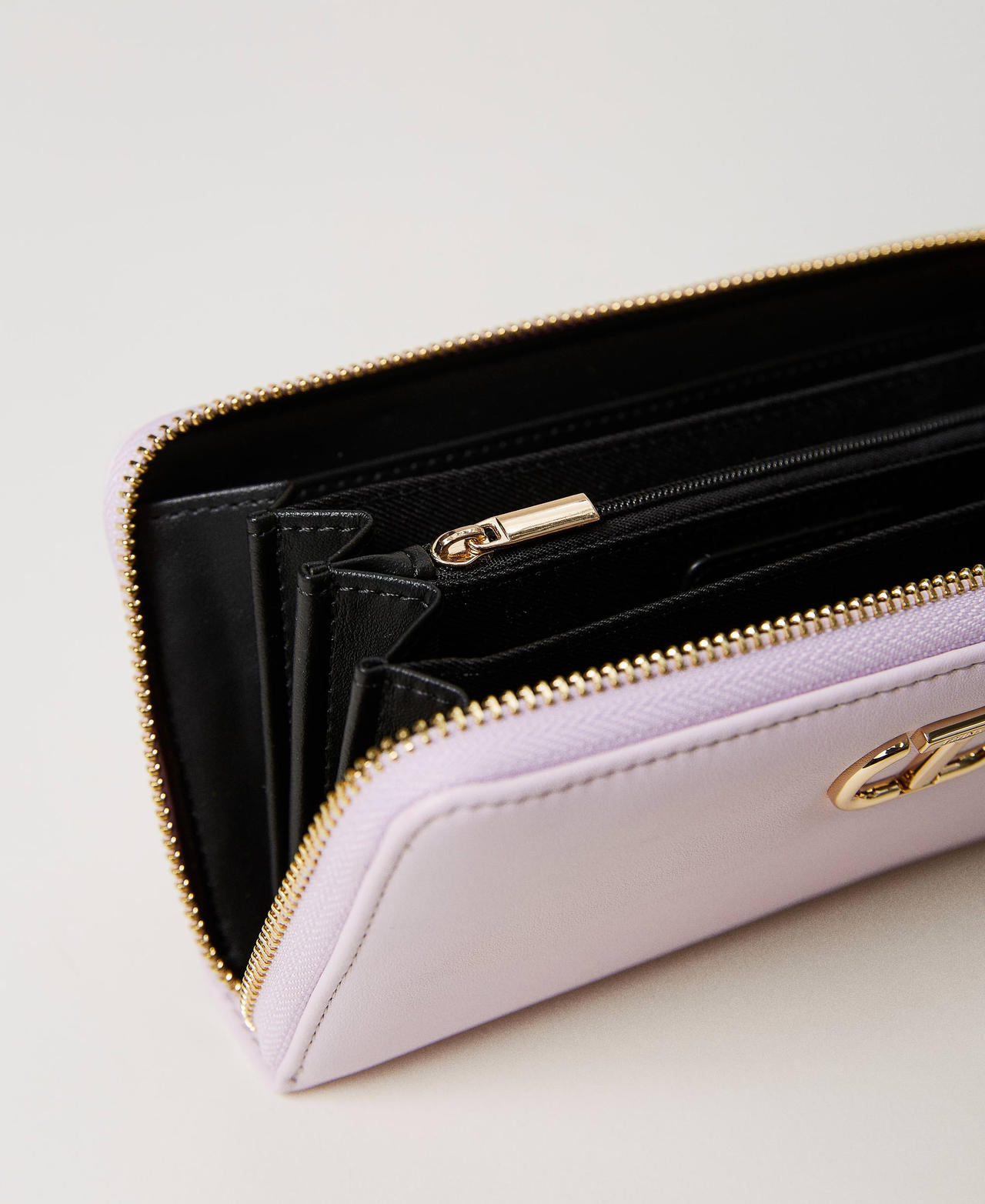 Leather-like wallet with metal Oval T