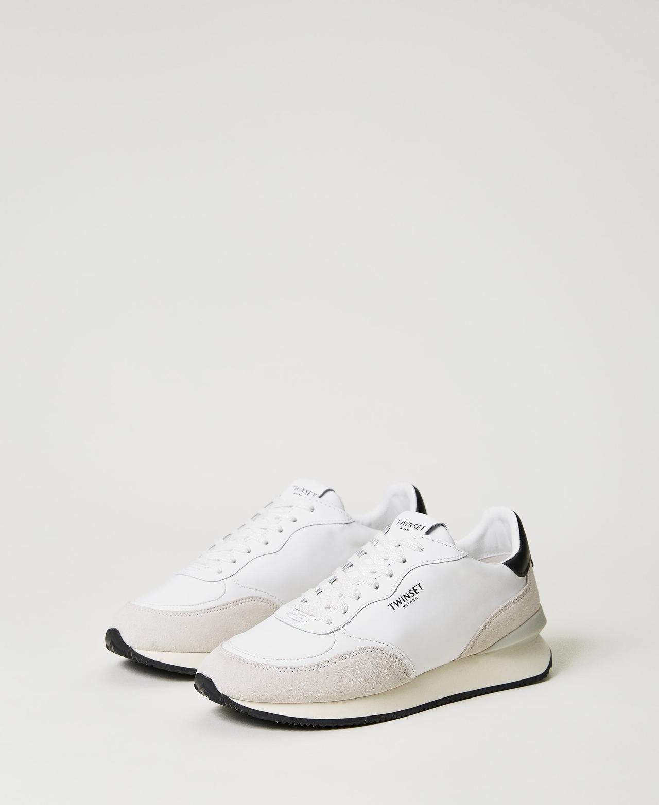 Trainers with contrasting inserts Two-tone Optical White / Black Woman 231TCP030_01870_02