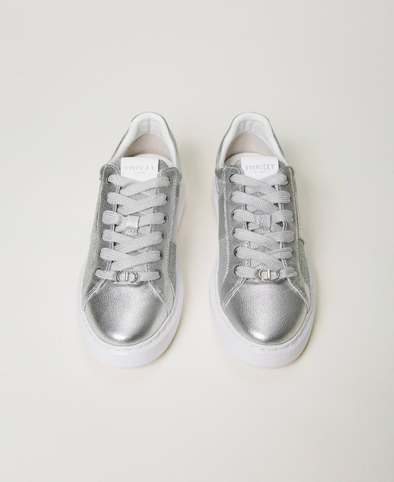 Laminated trainers with glitter inserts
