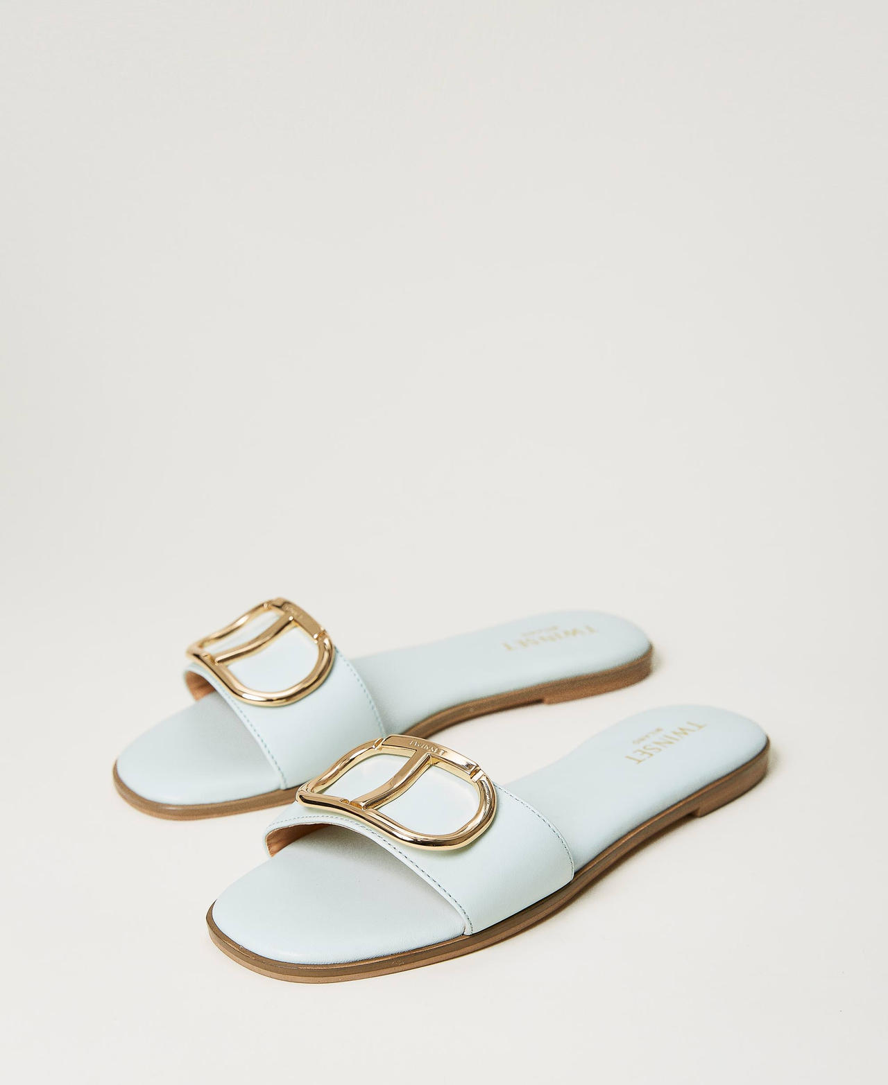 Sandales slides en cuir avec Oval T