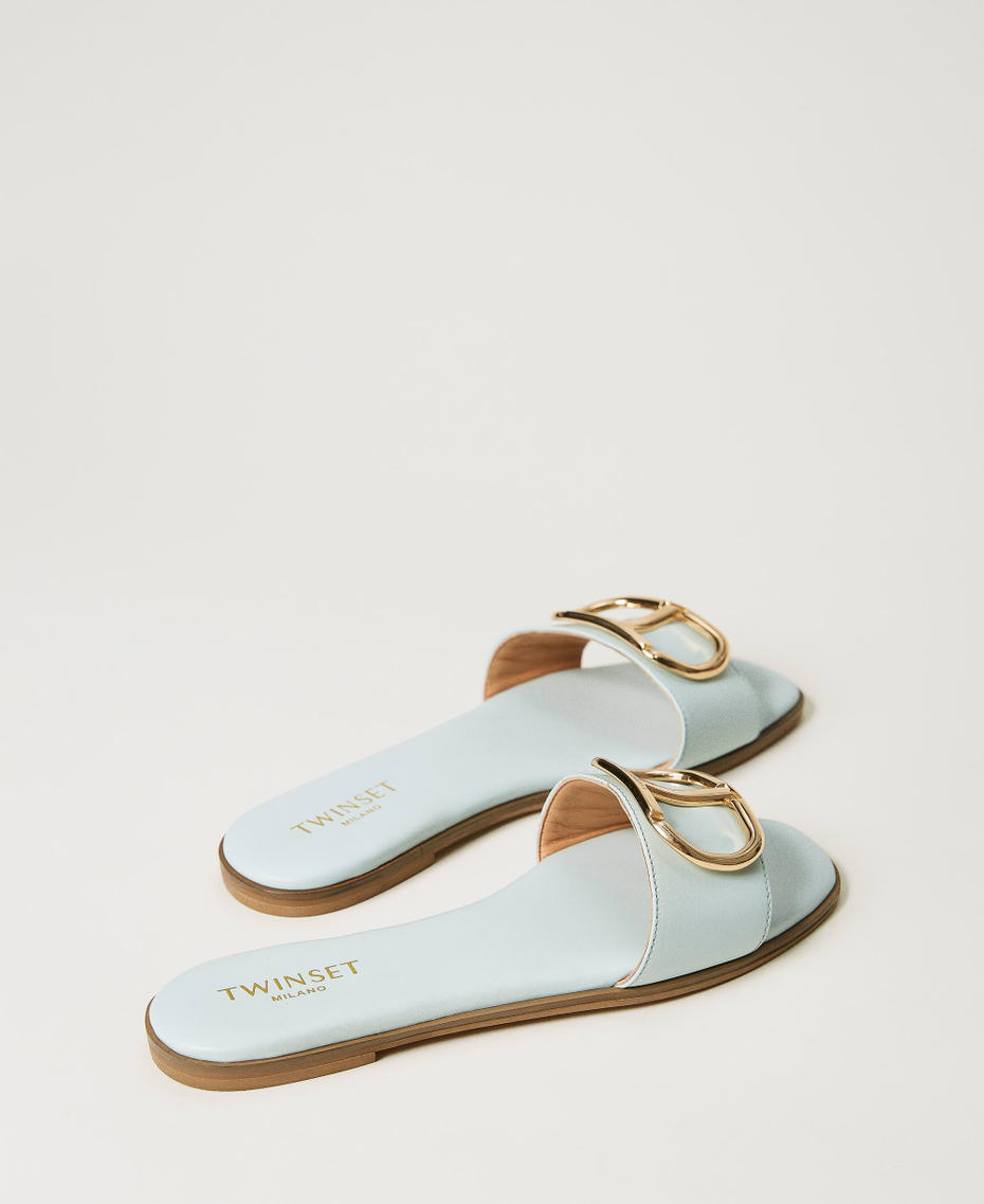 Sandales slides en cuir avec Oval T