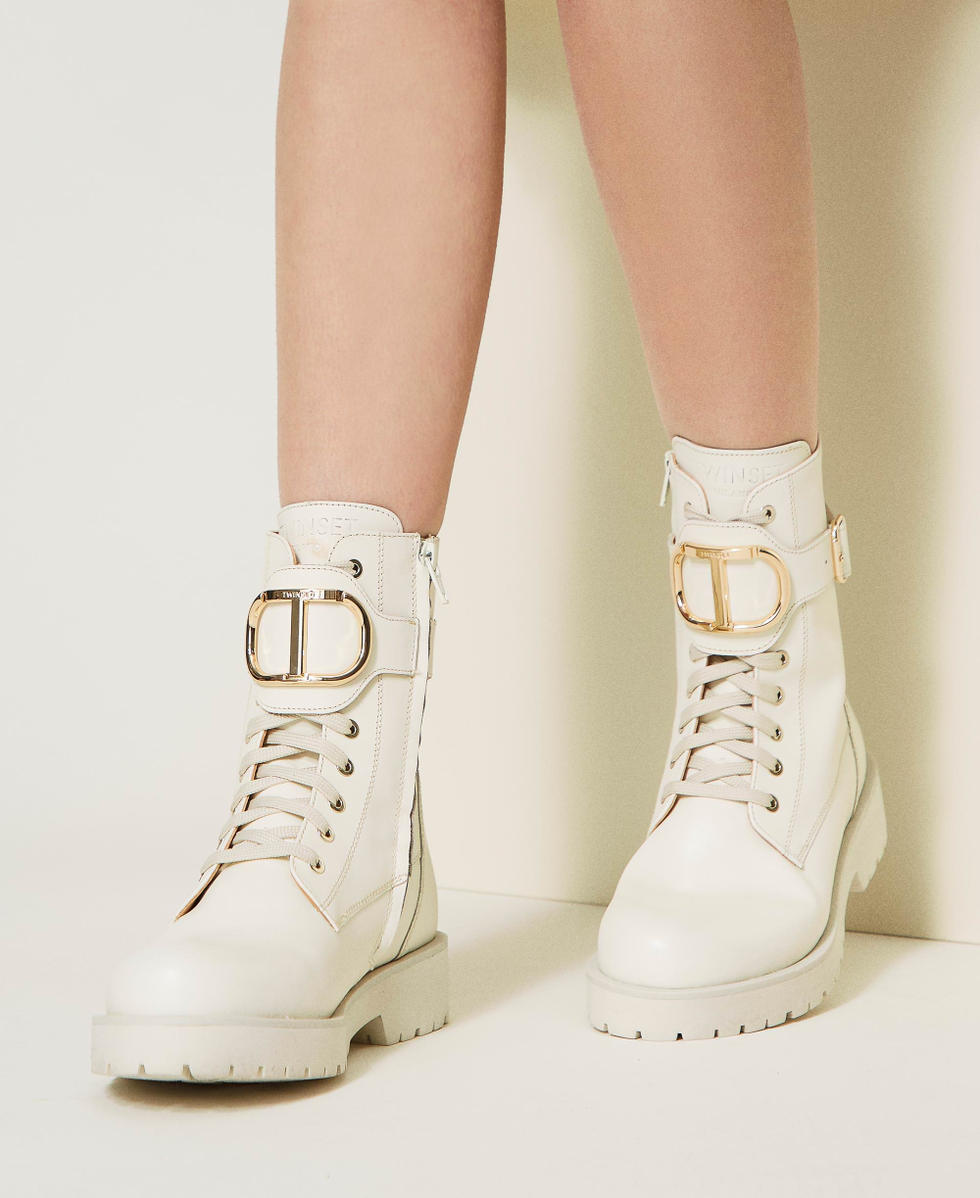 Leather combat boots with Oval T