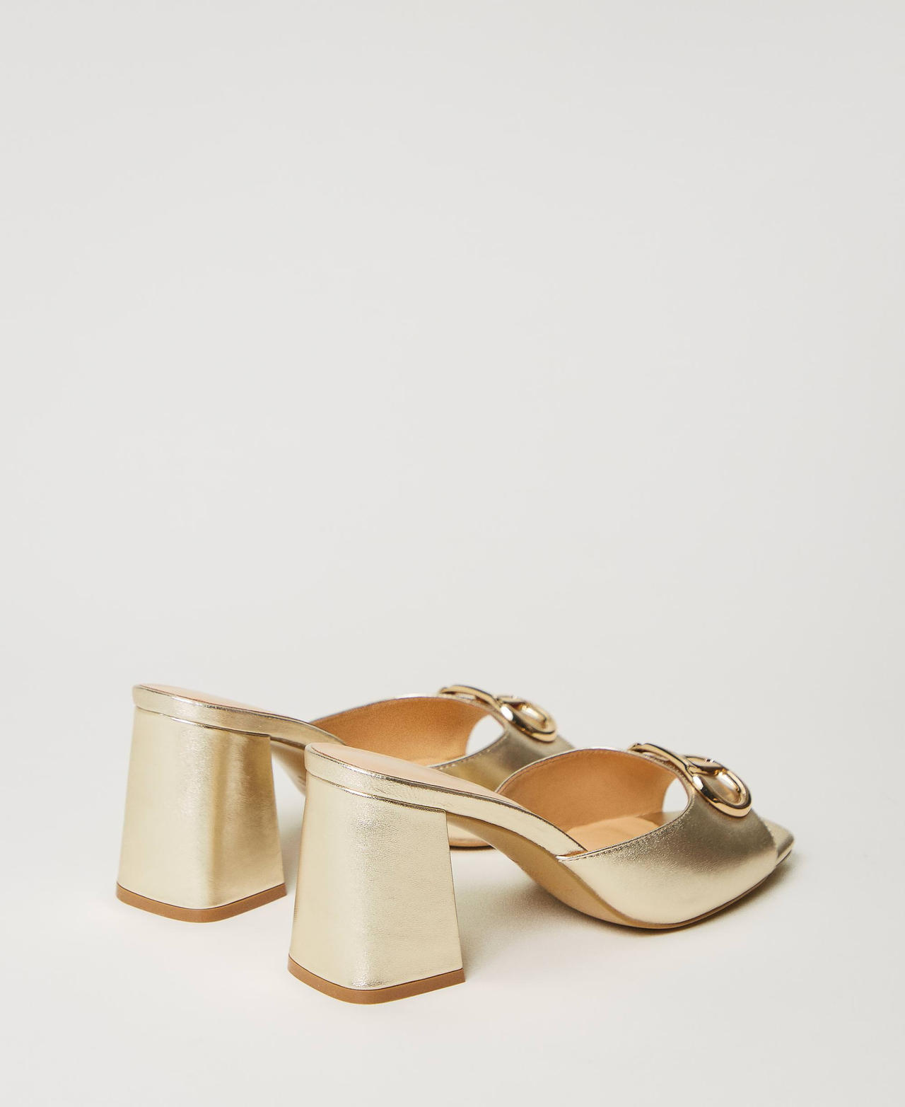 Laminated leather mules with Oval T