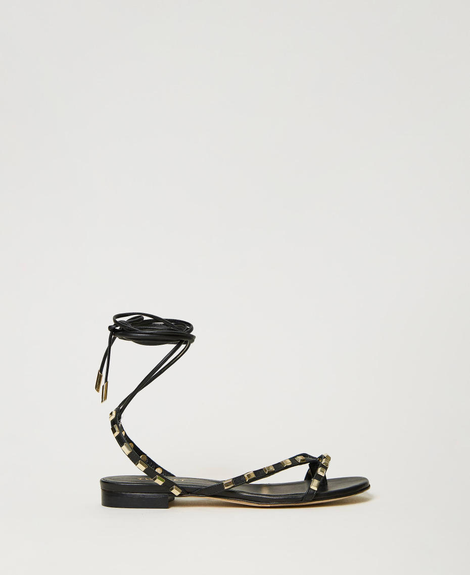 Thongs sandals with studs and laces
