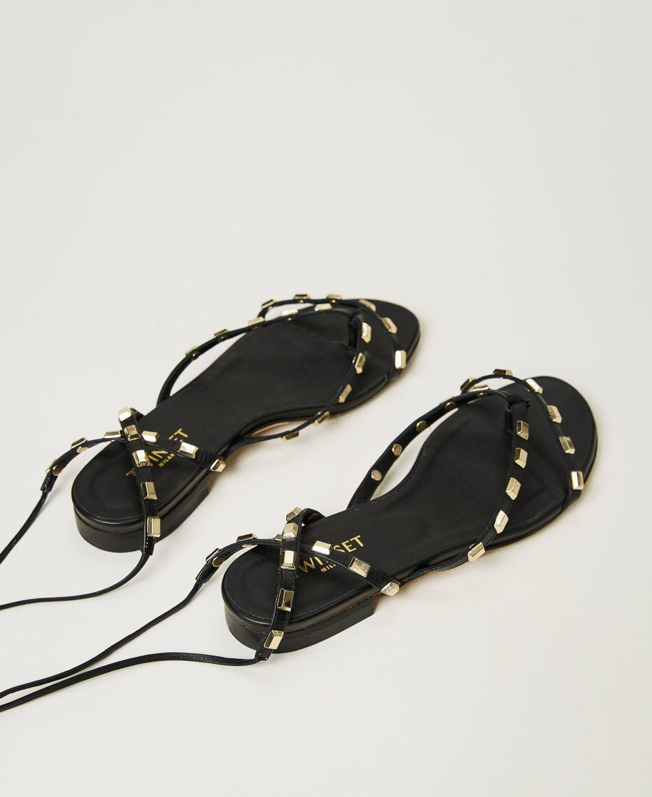 Thongs sandals with studs and laces