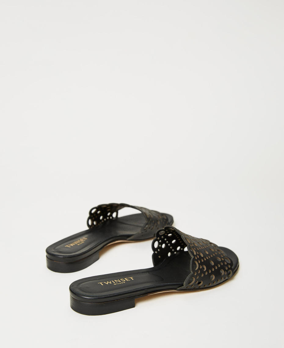 Sandales slides en cuir découpé au laser